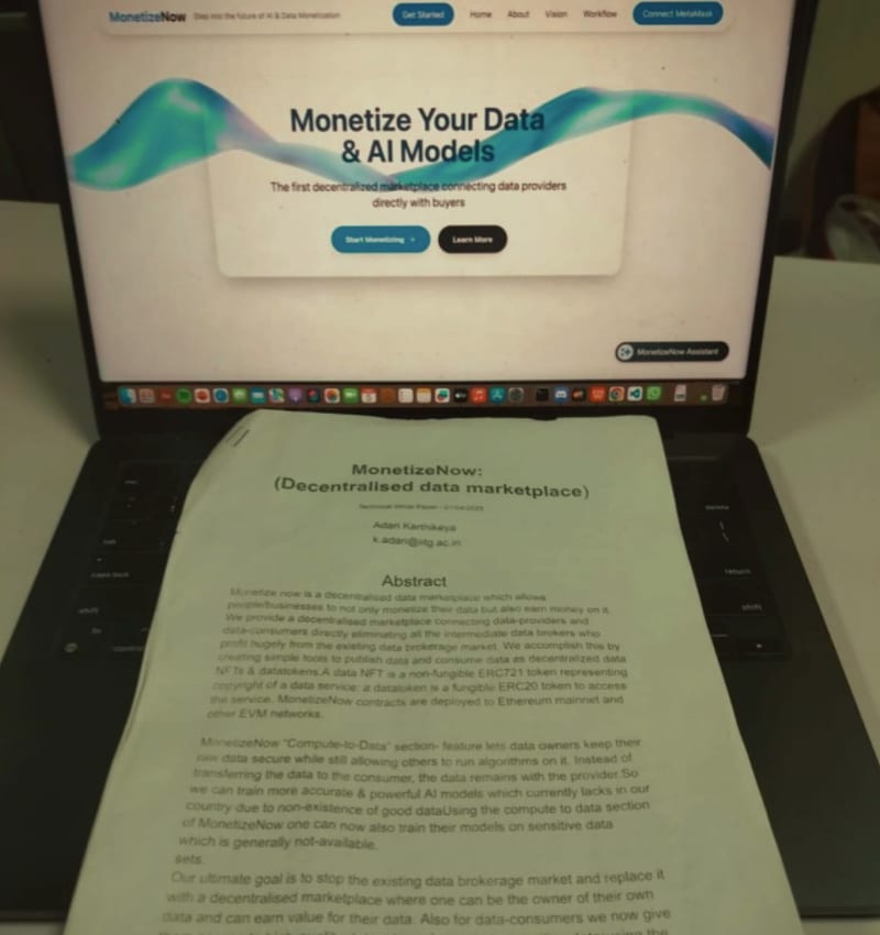 MonetizeNow site and whitepaper on a laptop