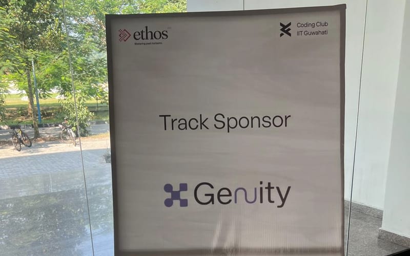 Track Sponsor standee with the Genuity logo at Ethos, IIT Guwahati
